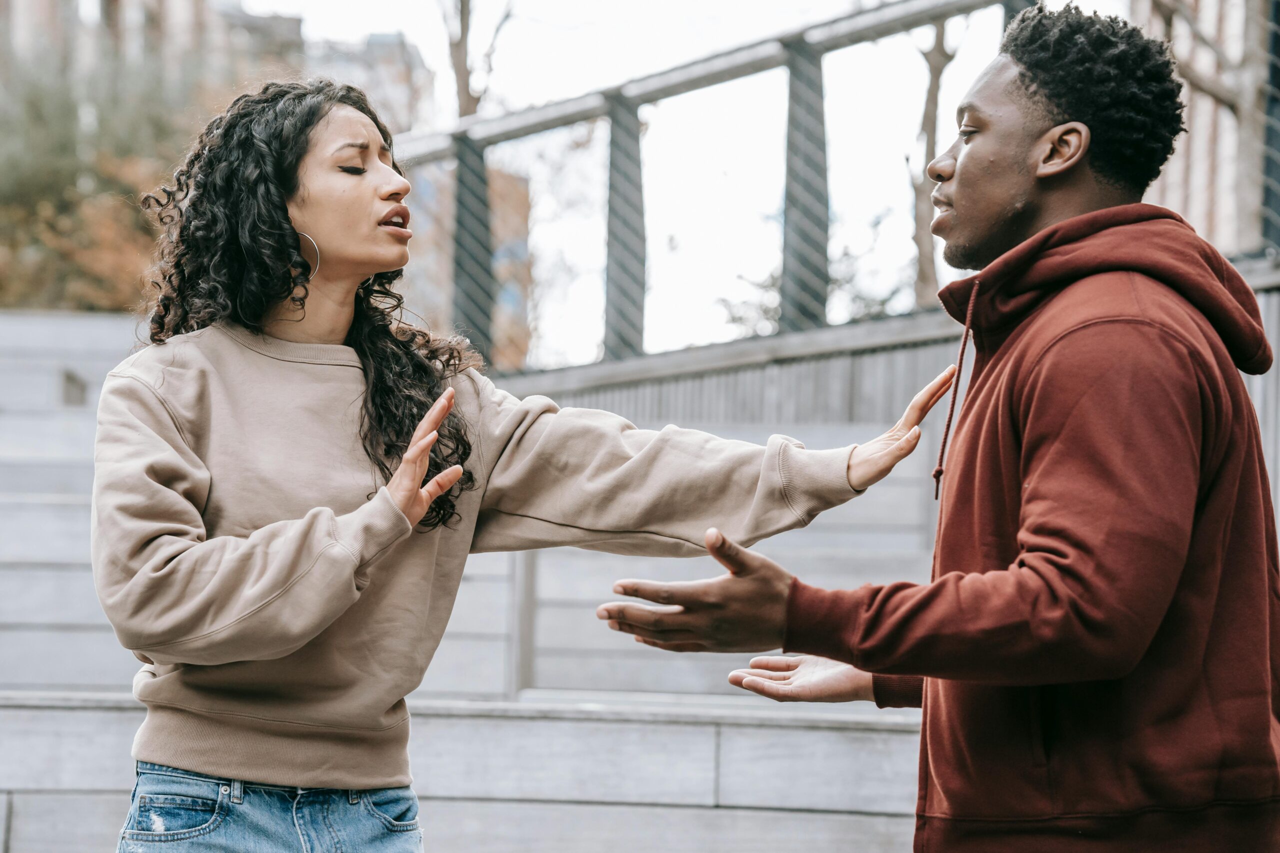 woman and man couple arguing