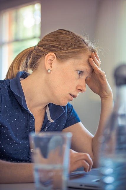 stress and anxiety woman at computer