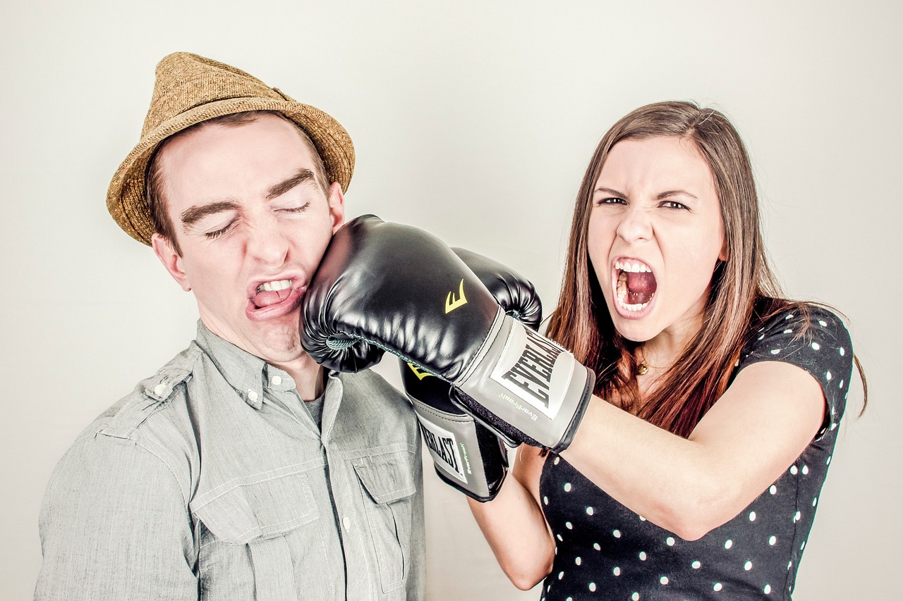 couple arguing boxing glove