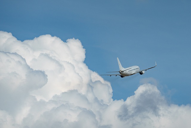 airplane flying through clouds