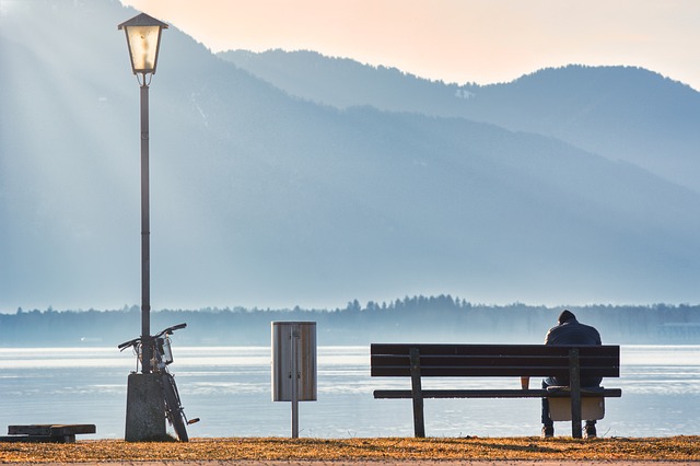 man alone on bench