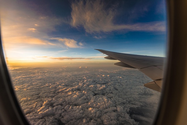 airplane window and clouds